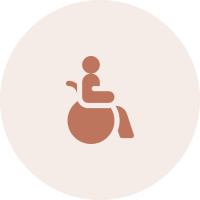 Wheelchair icon on dark circular background.