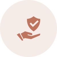 Hand holding shield with checkmark icon.